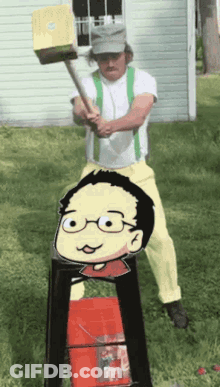 Man Holding Hammer In Front Of Cartoon Man GIF