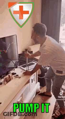 Man Holding Hammer In Front Of TV Saying Pump It GIF