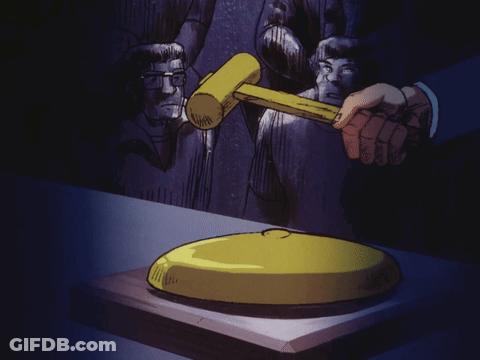 Man Holding Hammer Over Yellow Object GIF