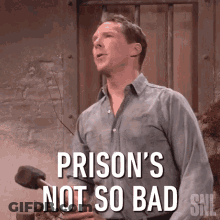 Man Holding Hammer Saying Prison's Not So Bad GIF
