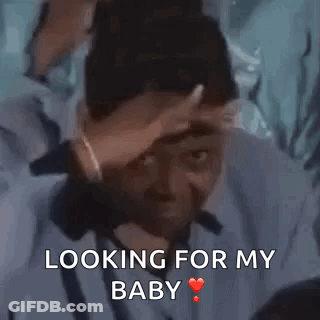 Man Holding Hand To Head Looking For Baby GIF