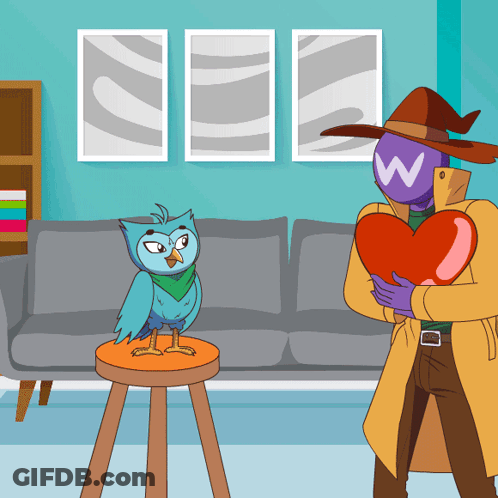 Man Holding Heart With W On Head GIF