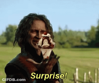 Man Holding Ice Cream Cone Says Surprise GIF