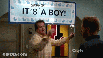Man Holding It's A Boy Sign GIF
