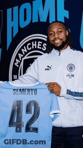 Man Holding Jersey Number 42 GIF