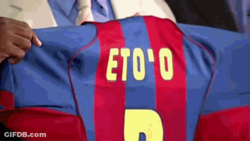 Man Holding Jersey With Name Eto'o GIF