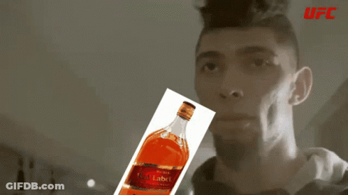 Man Holding Johnnie Walker Red Label Whiskey GIF