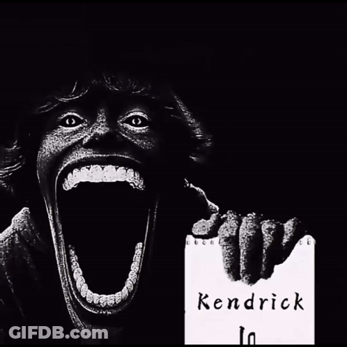 Man Holding Kendrick Listening Book GIF