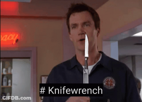 Man Holding Knife With #Knifewrench GIF