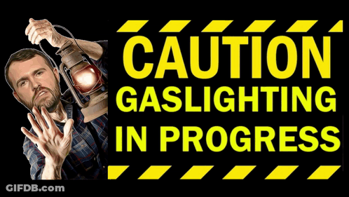 Man Holding Lantern With Caution Gaslighting In Progress GIF