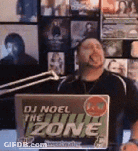 Man Holding Laptop Saying DJ Noel The Zone GIF