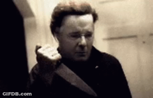 Man Holding Large Knife At Camera GIF