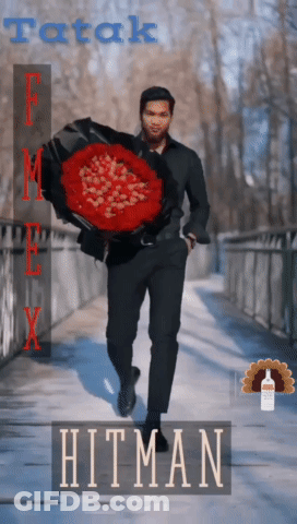 Man Holding Large Red Bouquet With Hitman GIF