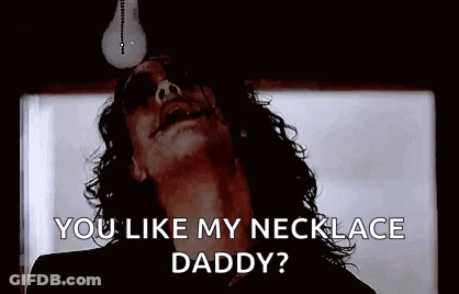 Man Holding Light Bulb In Mouth Asking If He Likes His Necklace Daddy GIF