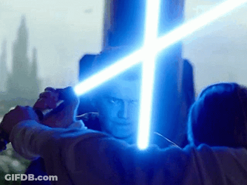 Man Holding Light Saber GIF