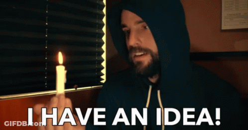 Man Holding Lit Candle I Have An Idea GIF
