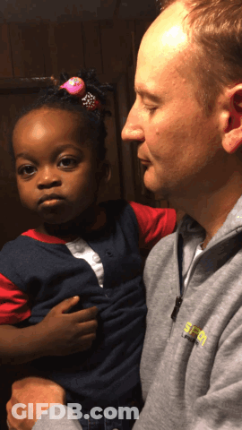 Man Holding Little Girl In Grey SEO Sweatshirt GIF