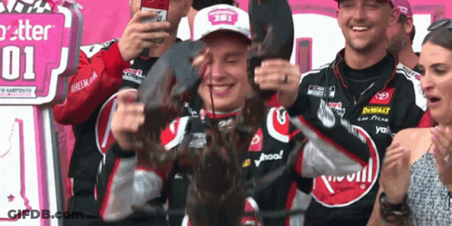 Man Holding Lobster In Front Of Better 01 Sign GIF