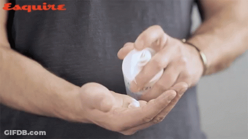 Man Holding Lotion Bottle Esquire GIF