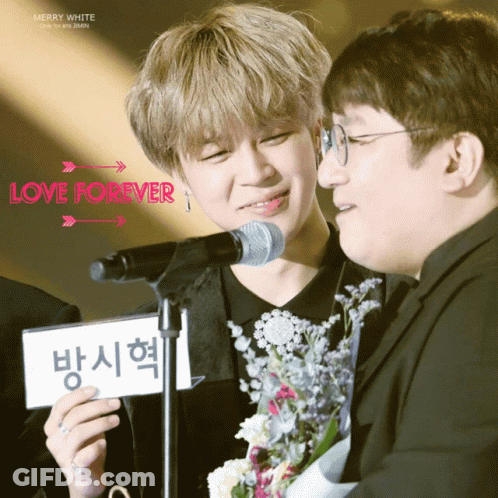 Man Holding Love Forever Sign GIF