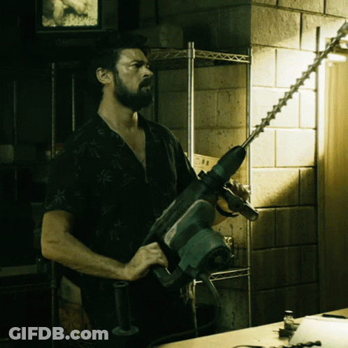 Man Holding Makita Drill GIF