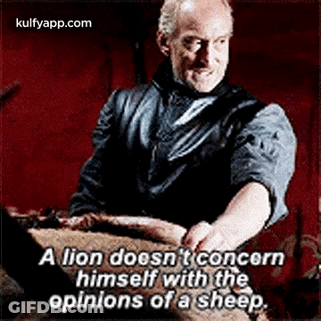 Man Holding Meat Lion Doesn't Concern Himself With Opinions Of A GIF