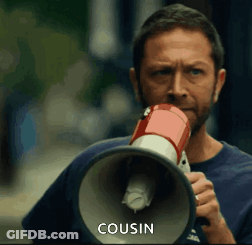 Man Holding Megaphone With Cousin GIF
