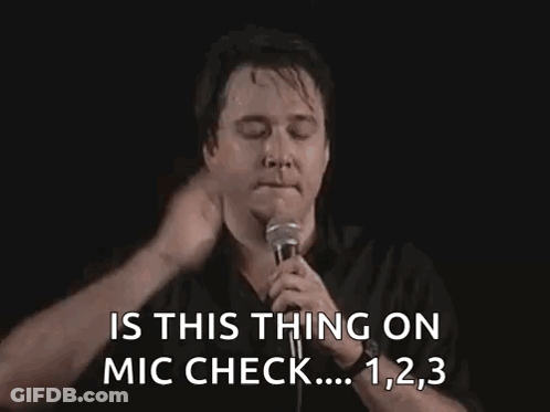 Man Holding Mic Saying Is This Thing On Mic Check GIF