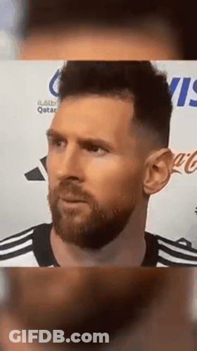 Man Holding Microphone At Qatar Airways Wall GIF