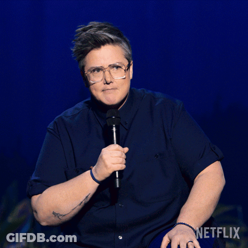Man Holding Microphone Blue Netflix Background GIF