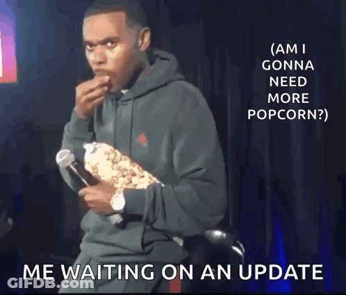 Man Holding Microphone Eating Popcorn GIF
