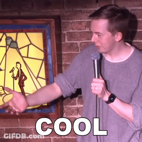 Man Holding Microphone In Front Of Stained Glass Window Cool Shirt GIF