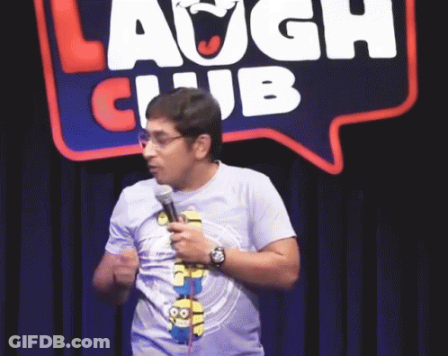 Man Holding Microphone In Laugh Club GIF