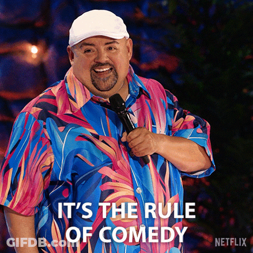 Man Holding Microphone It's The Rule Of Comedy GIF
