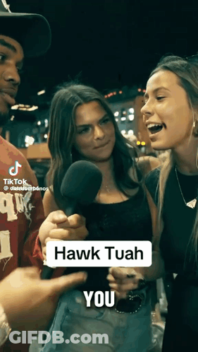 Man Holding Microphone Saying Hawk Tuah You GIF