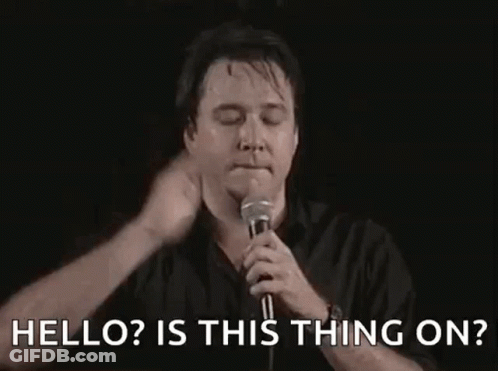 Man Holding Microphone Saying Hello Is This Thing On GIF