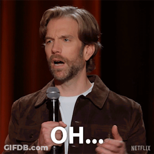 Man Holding Microphone Saying Oh GIF