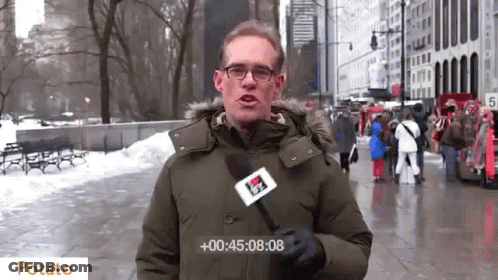 Man Holding Microphone Saying Potato GIF