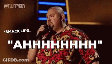 Man Holding Microphone Saying Smack Lips Ahhhh GIF