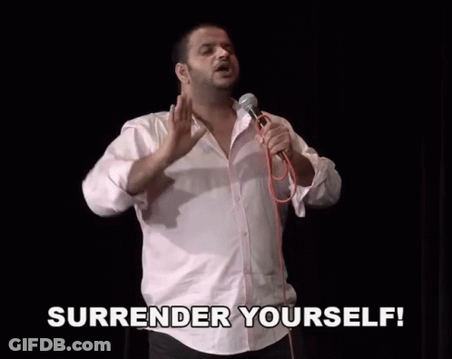 Man Holding Microphone Saying Surrender Yourself GIF