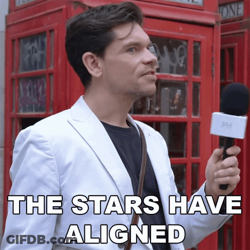 Man Holding Microphone Saying The Stars Have Aligned GIF