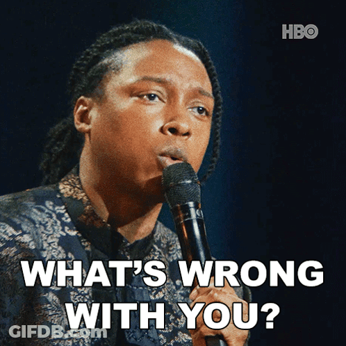 Man Holding Microphone Saying What's Wrong With You GIF
