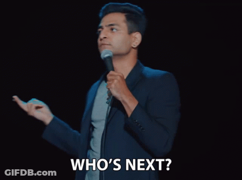 Man Holding Microphone Saying Who's Next GIF