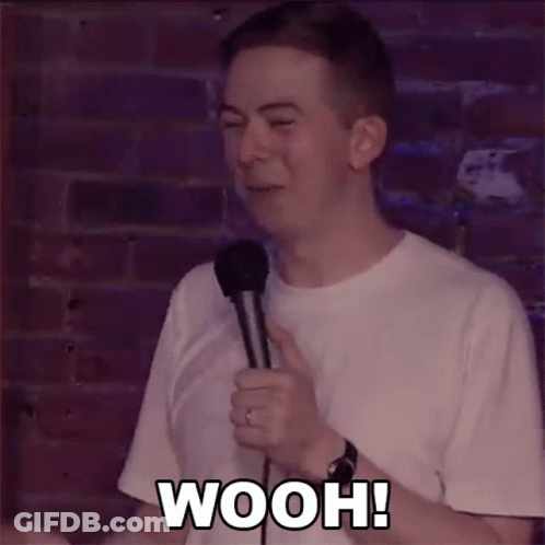 Man Holding Microphone Saying Wooh GIF