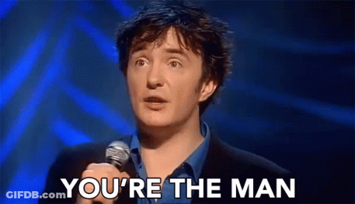 Man Holding Microphone Saying Youre The Man GIF