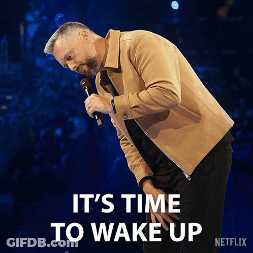 Man Holding Microphone Says It's Time To Wake Up GIF