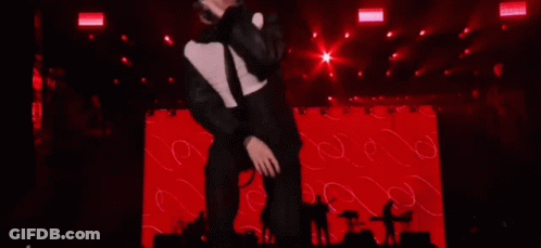 Man Holding Microphone Singing GIF