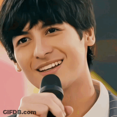 Man Holding Microphone Smiling GIF