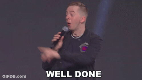 Man Holding Microphone With Well Done Below GIF