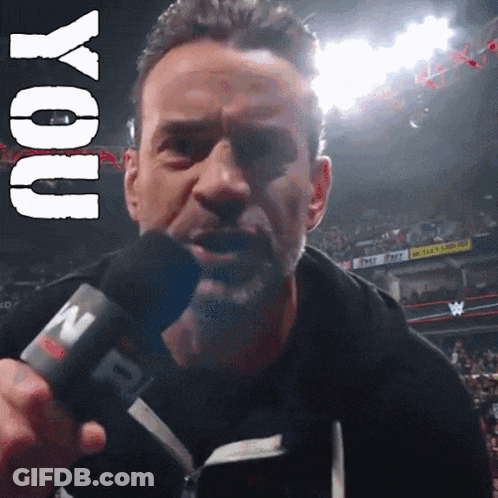 Man Holding Microphone With Word You Above GIF